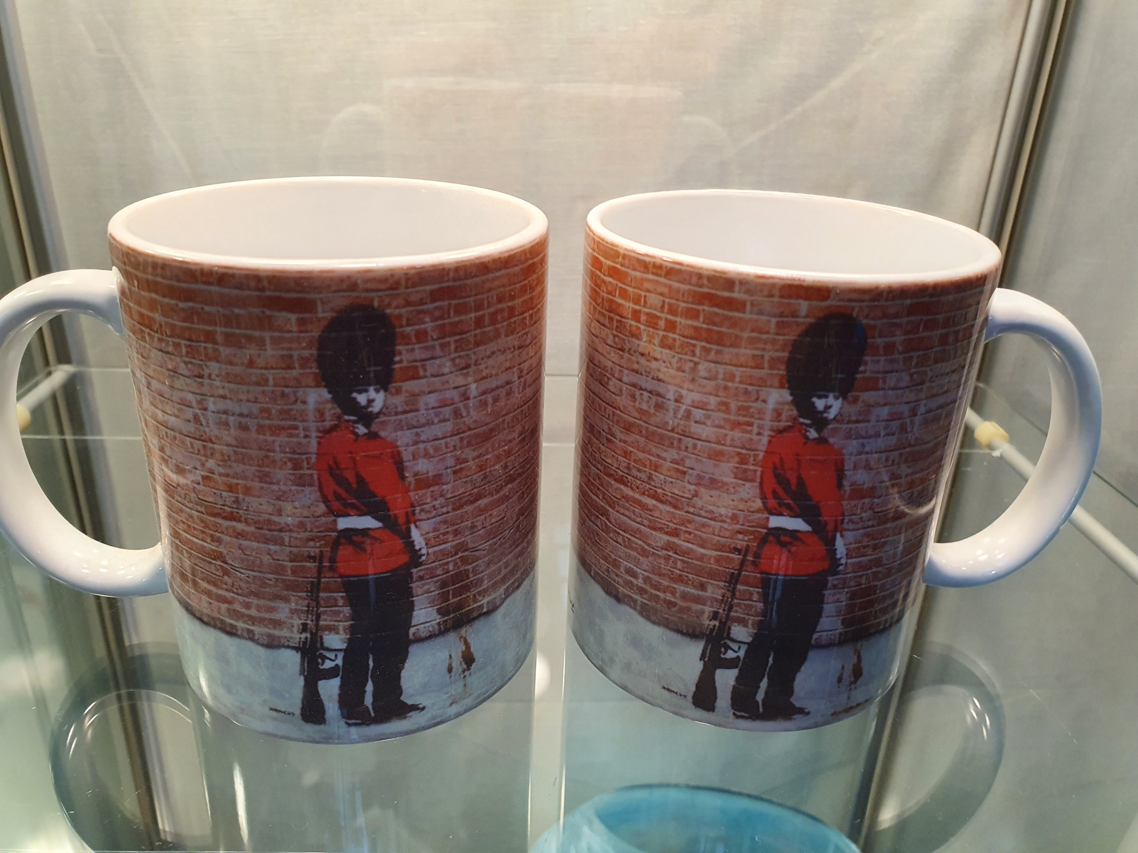 Banksy Mug Pi@@ing Soldier  image 0