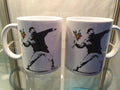 Banksy Mug Love Is In The Air image 0