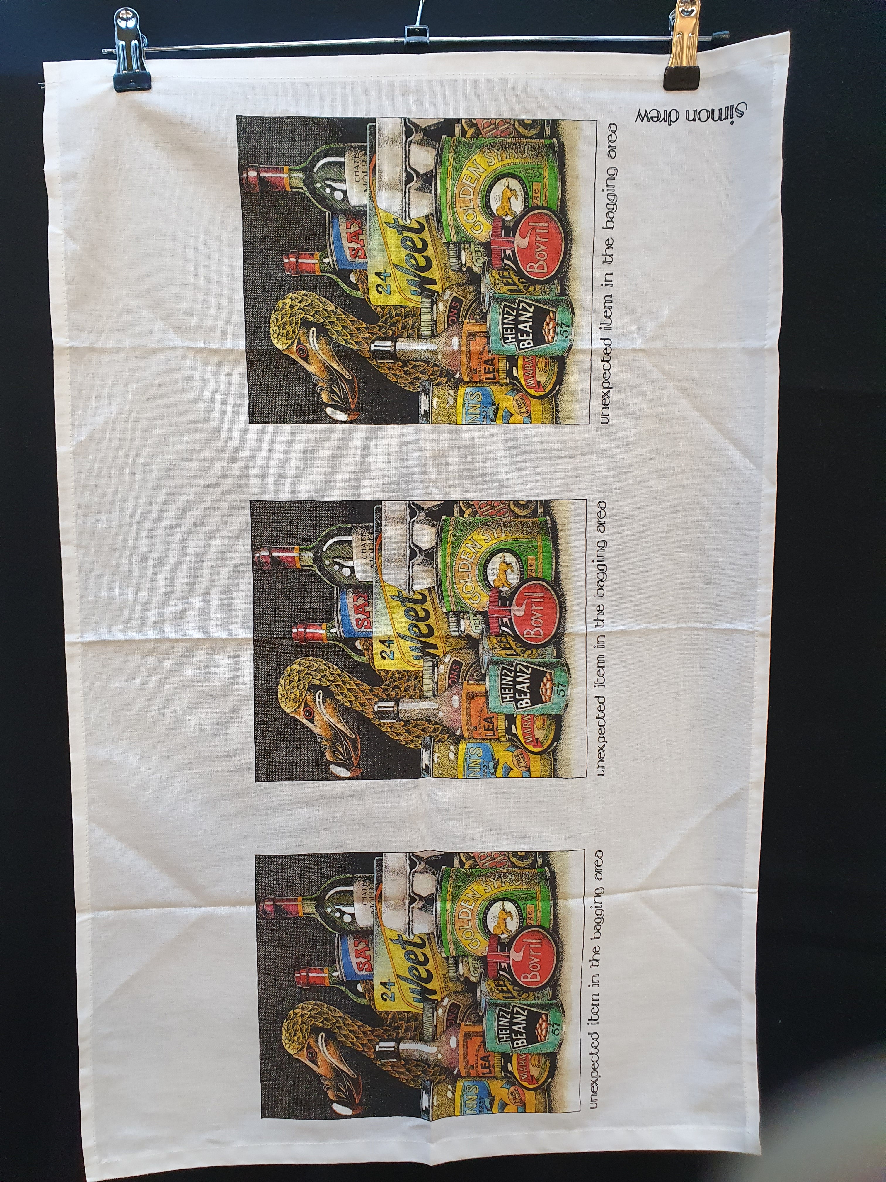 Simon Drew T towel Unexpected item in bagging area image 0