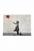 Banksy postcard on white background