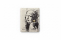 Banksy Girl with Burst Eardrum ceramic fridge magnet flat lay on white background