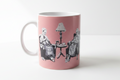 Banksy Punk Grannies pink ceramic mug on clean white surface, bright lifestyle product photography