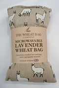 Llama print microwavable lavender wheat bag flat lay on white background