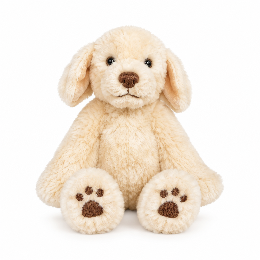 Cream-colored Wrendale Ralph Labrador plush toy seated against a clean white background