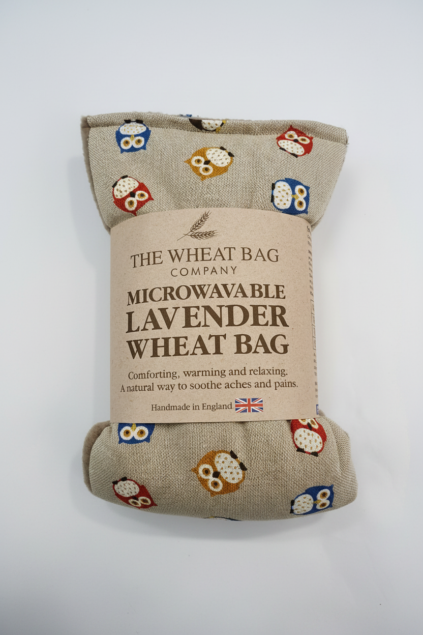 Owl print microwavable lavender wheat bag flat lay on white background