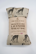Giraffe print microwavable lavender wheat bag flat lay on white background