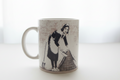 Banksy Maid In London ceramic mug on clean white surface, bright lifestyle product photography