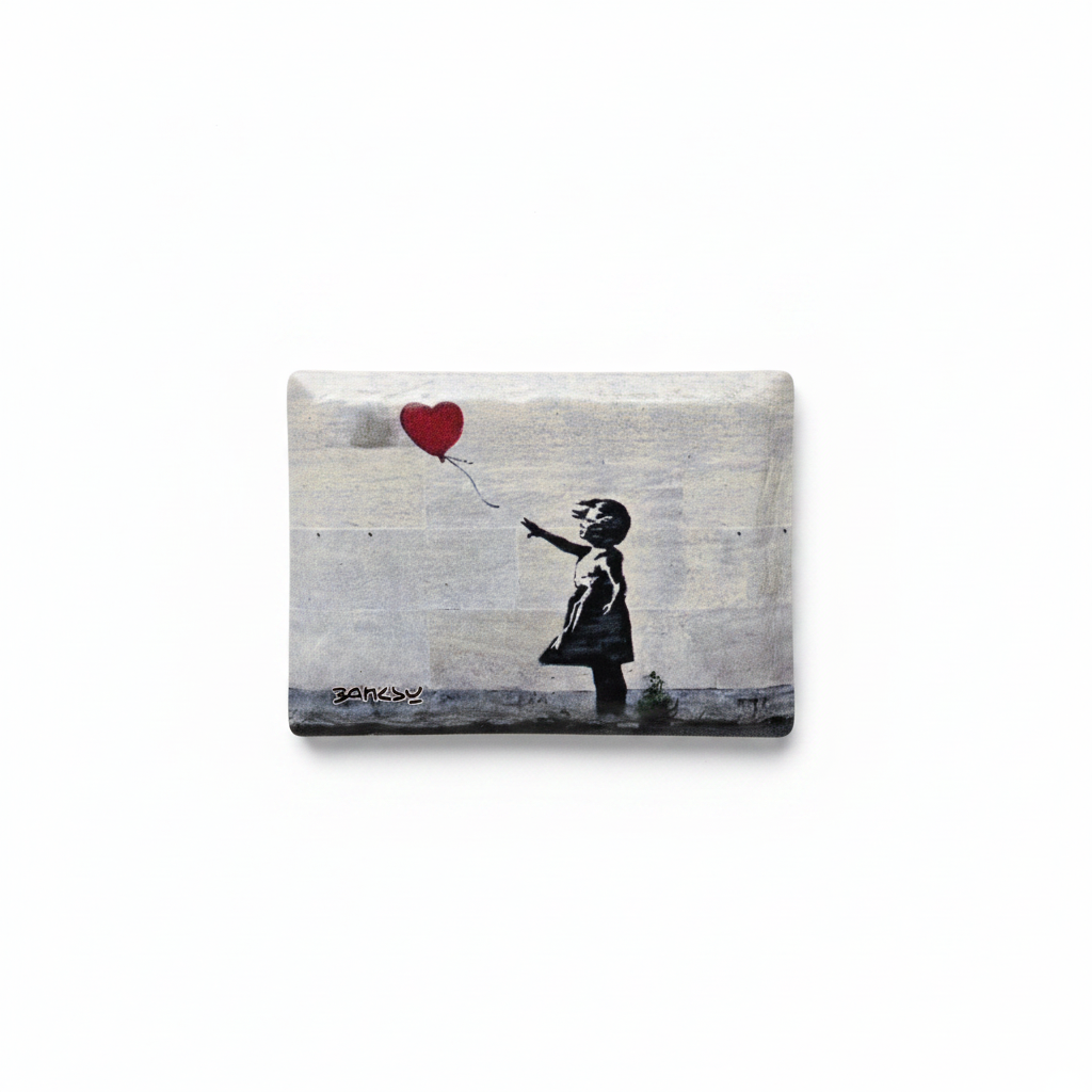 Banksy Girl with Balloon ceramic fridge magnet on white background