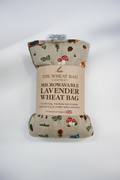 Woodland print microwavable lavender wheat bag flat lay on white background