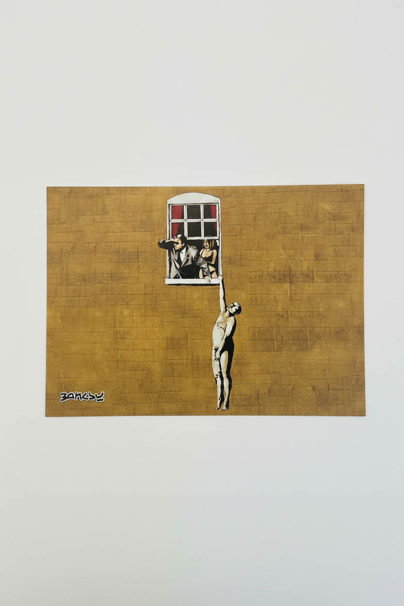 Banksy postcard on white background