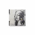 Banksy Girl with Burst Eardrum ceramic coaster flat lay on white background